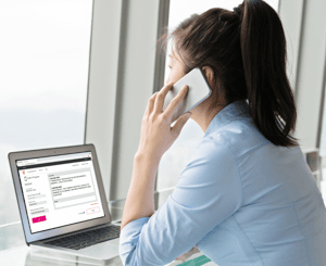 Adult female using T-Mobile IP Relay Two-Line Voice Carry-Over.